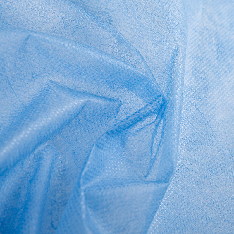 Fabraic Nonwoven Checkered Spunbond PP le haghaidh Maisc Leighis